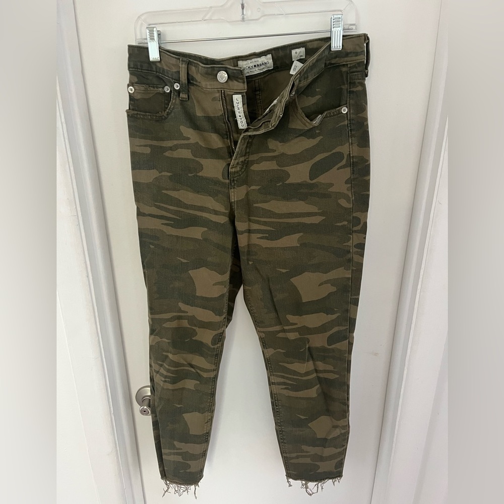 Lucky brand camo jeans. Distressed bottom seam. Never worn!